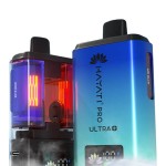 Hayati pro ultra plus device tilted with vape emitting from the mouthpiece on a white background