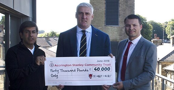 Fraser Cropper holding cheque