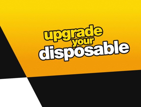 Text reads: "upgrade your disposable" against a chequered yellow, black and white background.