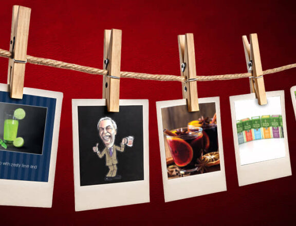 Row of polaroid pictures pegged individually to twine.
