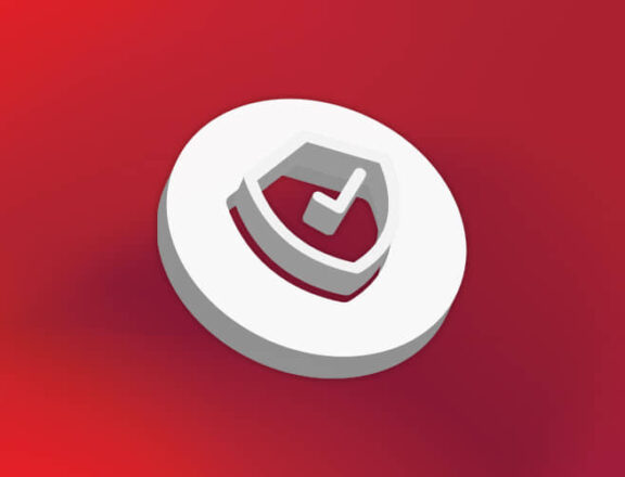 A 3D white icon on a red background, featuring a shield with a checkmark in the center to symbolize safety and protection.