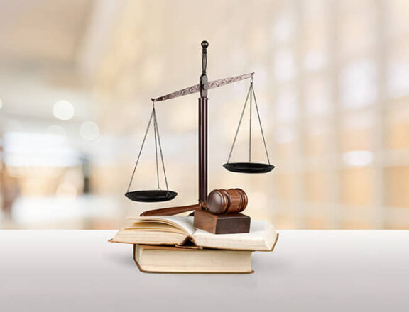 the tobacco and vapes act - scales on a table with a blurred background